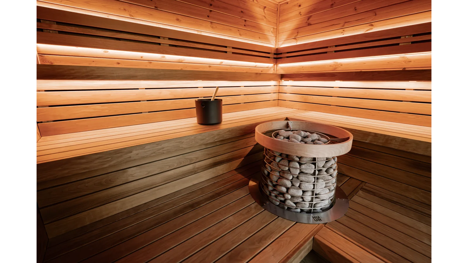 HUUM Hive 18kW heater loaded with sauna stones inside the Loyly Original