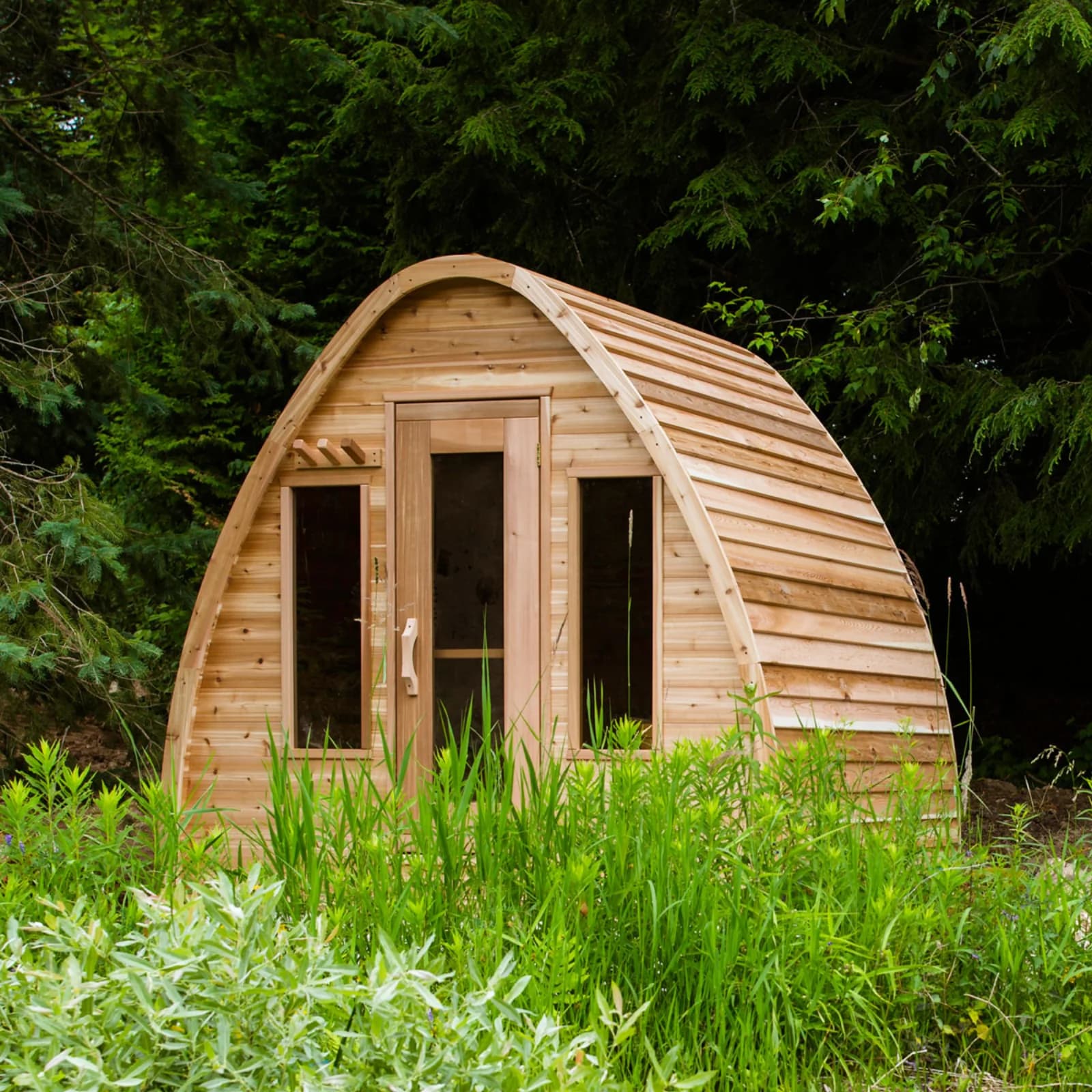 Dundalk Canadian Timber Pod cedar sauna with curved roof and flat glass front