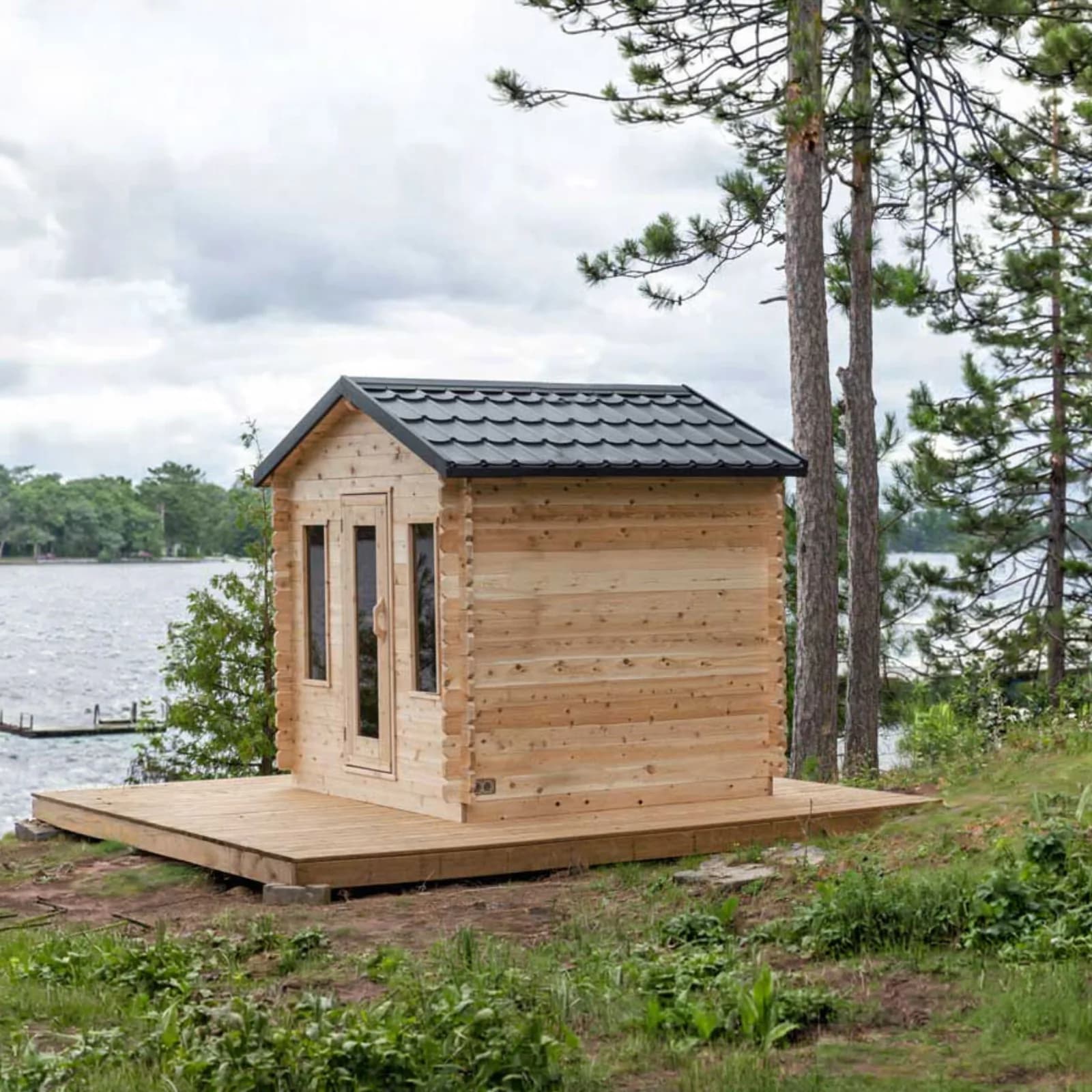 Dundalk Georgian Cabin outdoor cedar sauna with peaked roof and front window